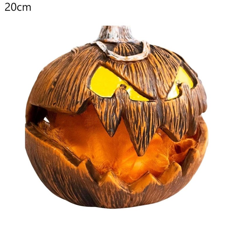Halloween spooky pumpkin head that can make sounds, light up, and rise and fall.